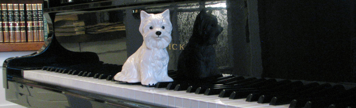 ceramic dog on piano header